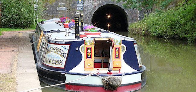 Hotelboat by a tunnel